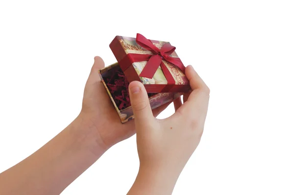 Child hands opening a gift box — Stock Photo, Image