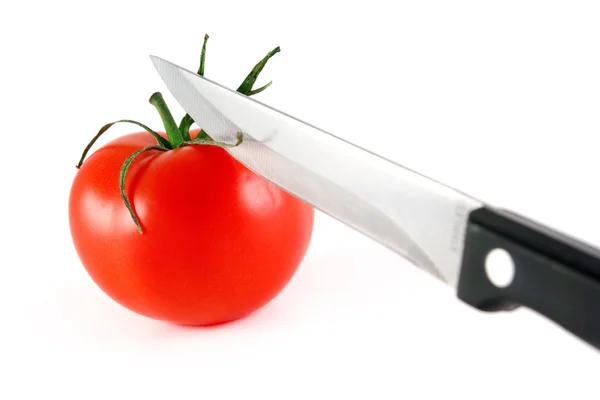 番茄和刀 免版税图库图片