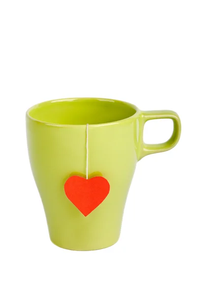 Teabag com rótulo em forma de coração no copo — Fotografia de Stock