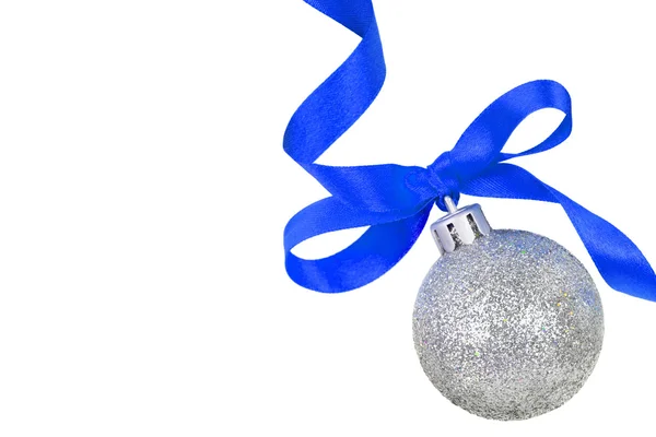 Christmas silver ball with blue ribbon — Stock Photo, Image