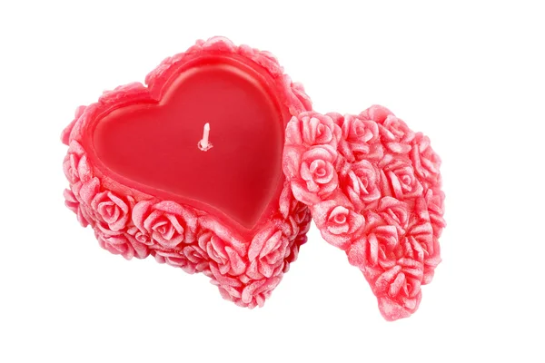 Heart-shaped wax candle with roses — Stock Photo, Image