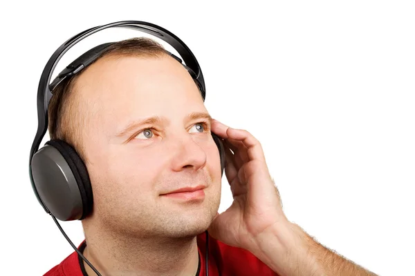 Jeune homme dans les écouteurs — Photo