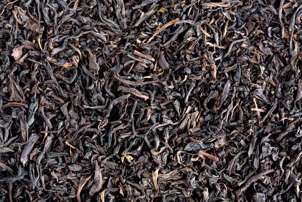 Текстура чёрного чая — стоковое фото