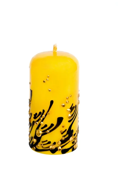 Жовта свічка ізольована на білому — стокове фото