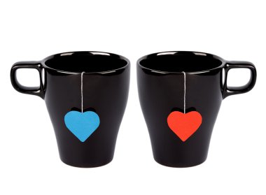 Tea bags with heart-shaped labels clipart