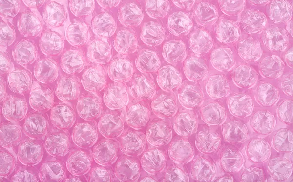 Hoja de plástico de burbuja rosa —  Fotos de Stock