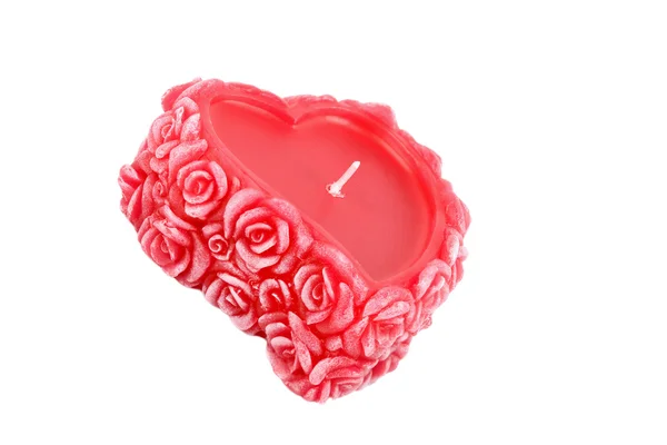 Heart-shaped candle with roses — Stock Photo, Image