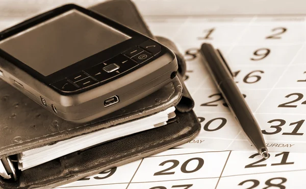Calendar, pen, organizer and PDA — Stock Photo, Image