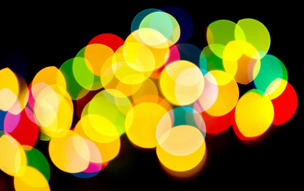 Luzes de férias desfocadas multicoloridas — Fotografia de Stock