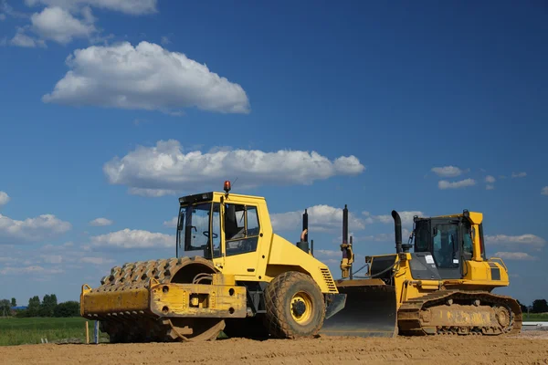 Sarı rulman ve buldozer — Stok fotoğraf