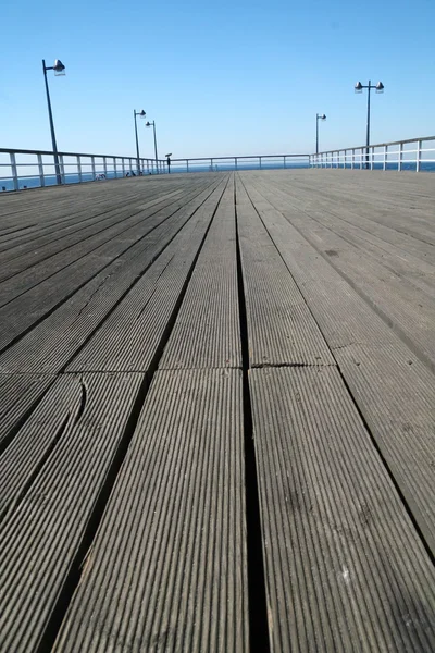 Wooden pier over a sea — Stock Photo, Image