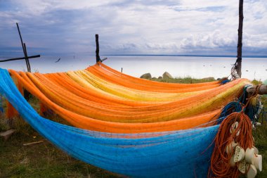 Colorful fishing nets drying clipart