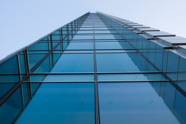 High-rise blue office building clipart