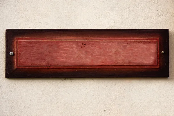 Stara drewniana tablica na ścianie — Zdjęcie stockowe