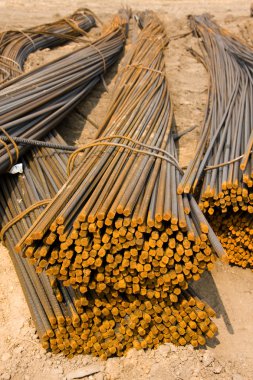 Rusty metal rods on a ground clipart