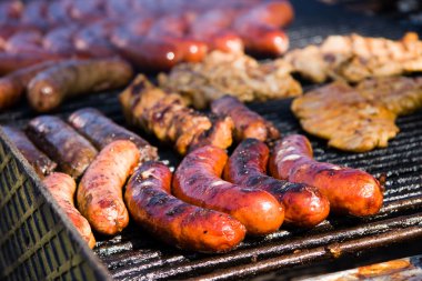 Sausages on barbecue clipart
