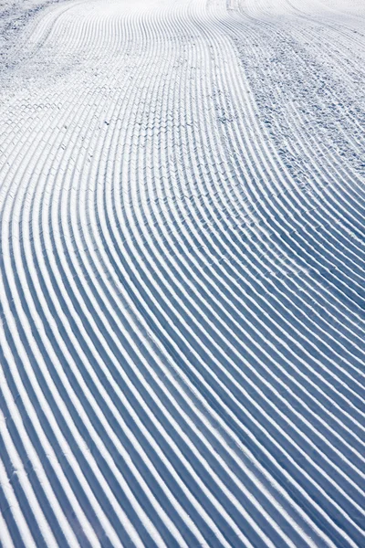 雪上滑雪坡的模式 — 图库照片