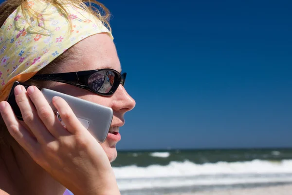 Woman talking on phone Stock Photo