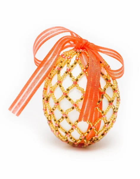 Egg with red ribbon — Stock Photo, Image