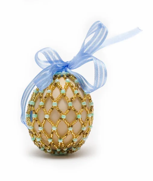 Egg with blue ribbon — Stock Photo, Image