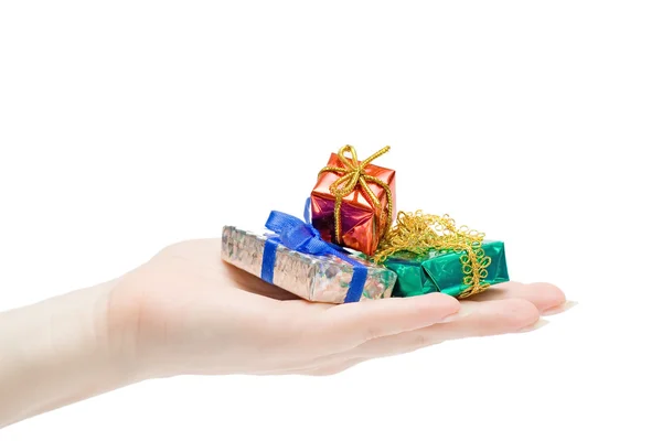 Gifts in a hand — Stock Photo, Image