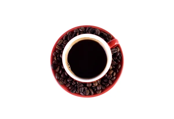 Tazza di caffè e chicchi di caffè su bianco — Foto Stock