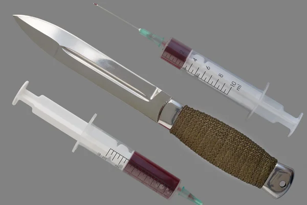 Knife and syringes — Stock Photo, Image