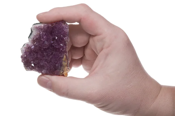 Hand with amethyst — Stock Photo, Image