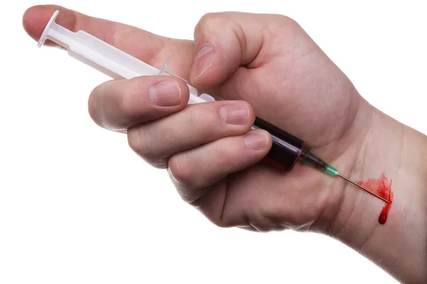 Hand, syringe, blood — Stock Photo, Image