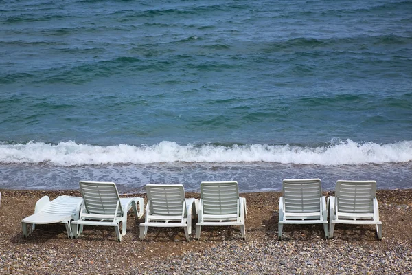 Stock image Empty beach chairs