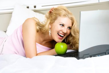 Beautiful girl with a laptop clipart