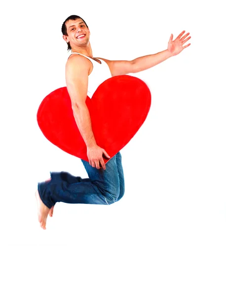 Young man with a heart — Stock Photo, Image