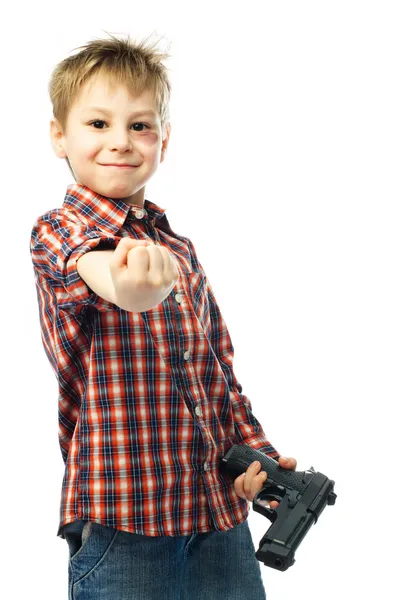 Stygg pojke med en pistol — Stockfoto