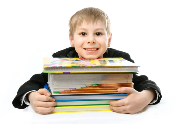 Schooljongen met boeken — Stockfoto