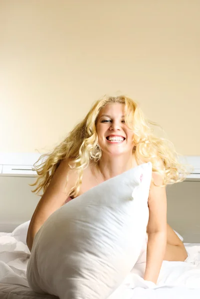 Happy girl in bed — Stock Photo, Image