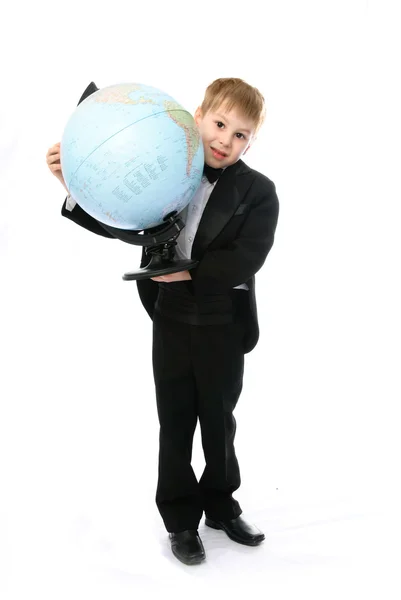 Schoolboy with a globe — Stock Photo, Image