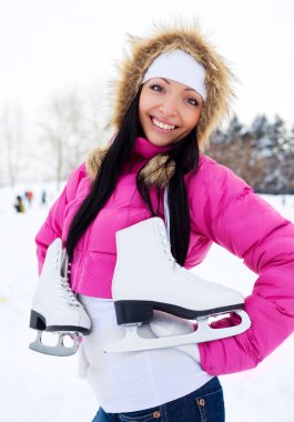 Girl going to ice skate clipart