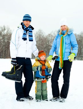 Family going ice skating clipart