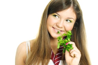 Pretty girl eating parsley clipart