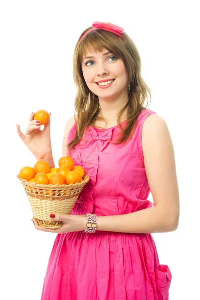 Mooi meisje met mandarijnen — Stockfoto