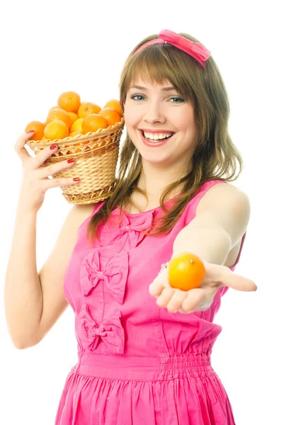 Frau mit Mandarinen — Stockfoto