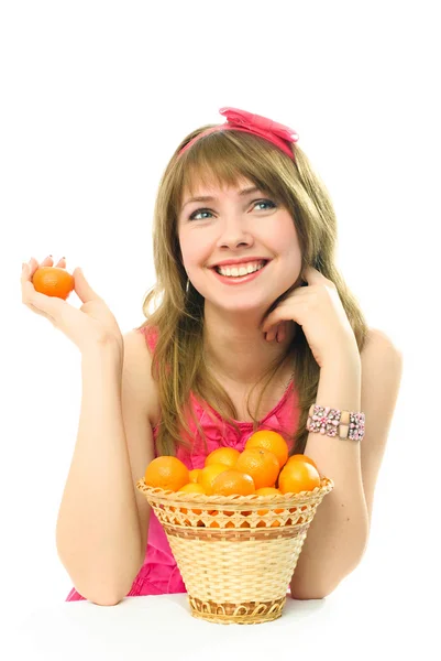 Meisje met mandarijnen — Stockfoto
