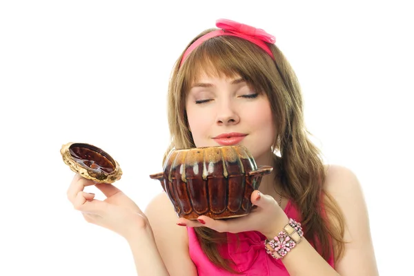 Meisje ruikt het eten — Stockfoto