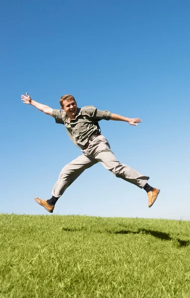 Happy jumping man — Stock Photo, Image