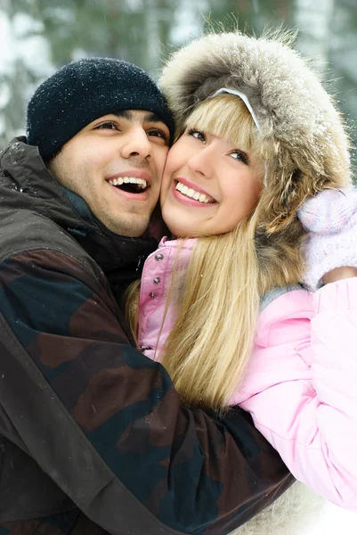 Couple in winter park Stock Picture
