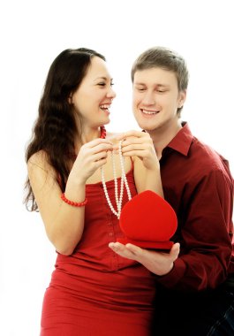 Man gives a present to his wife clipart