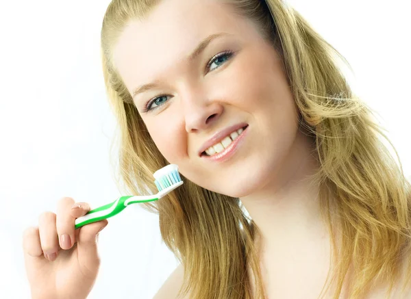 stock image Woman brushing her teeth