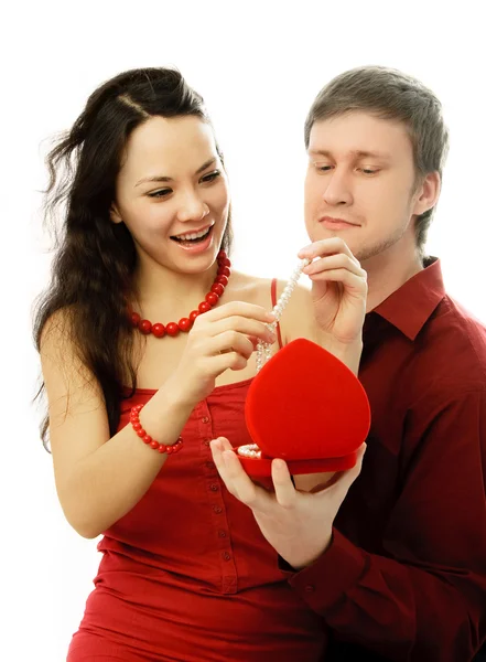 Man gives a present to his wife — Stock Photo, Image