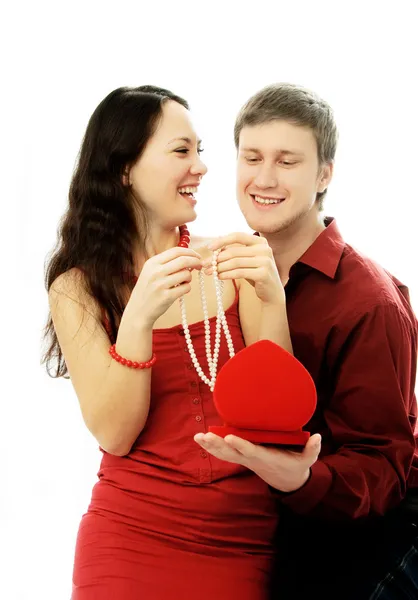 Man gives a present to his wife — Stock Photo, Image