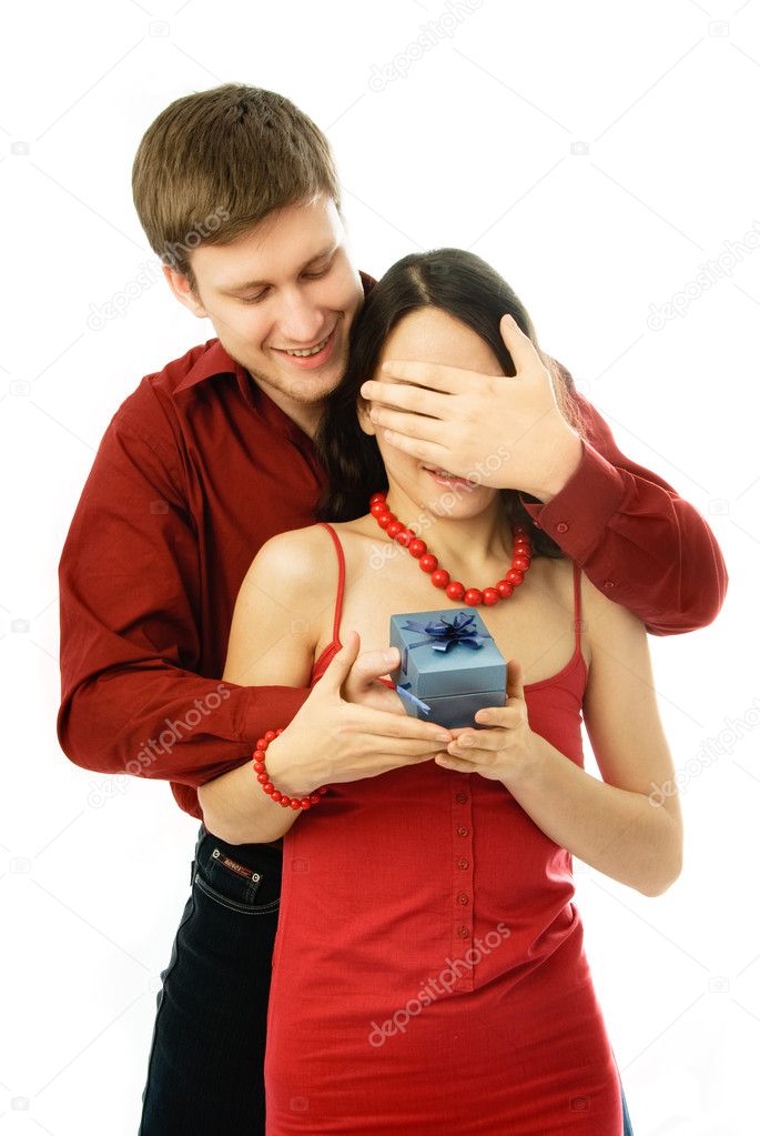 Man gives a present to his wife